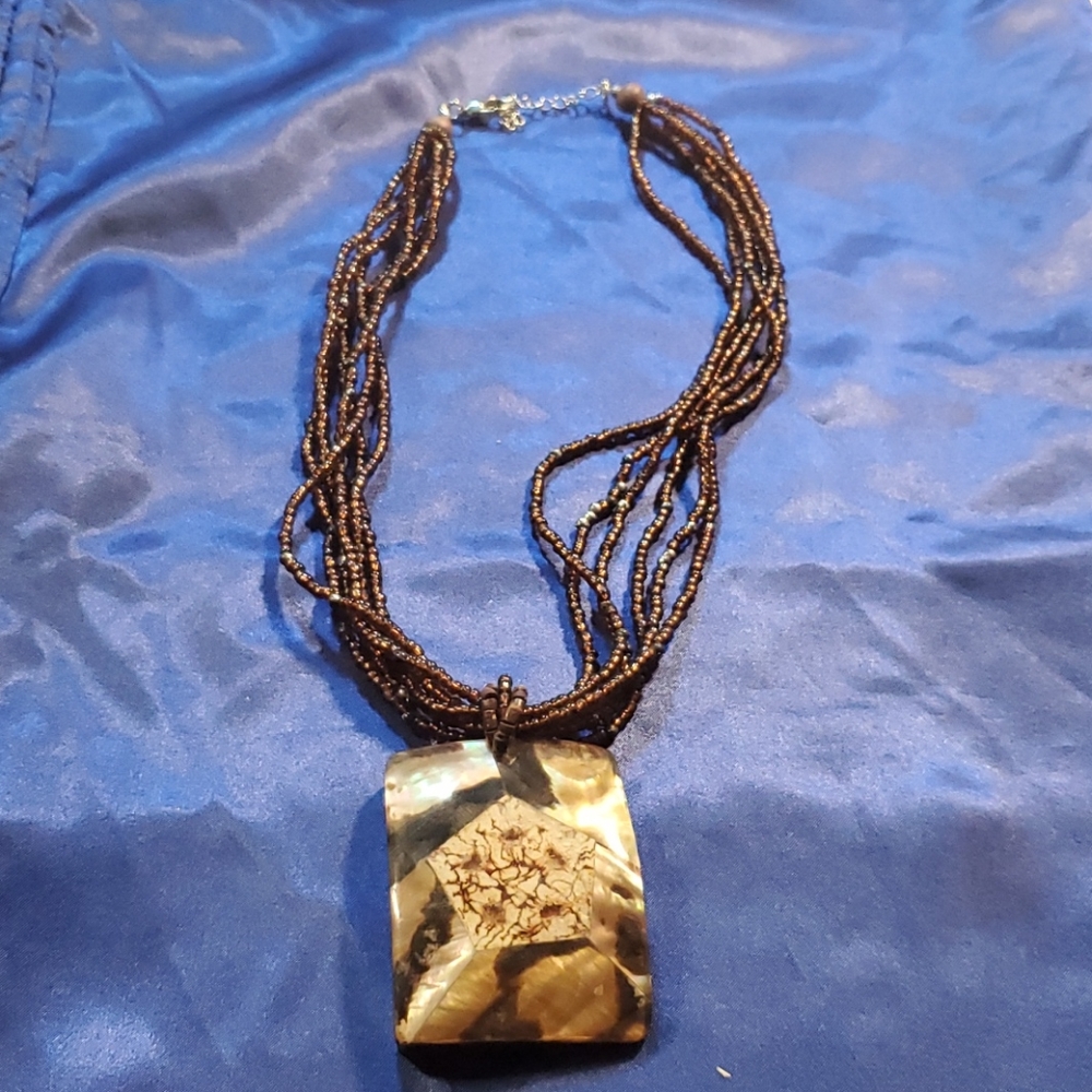 Brown beaded necklace.
